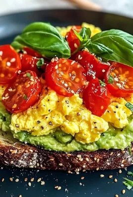 Avocado Toast with Scrambled Eggs and Tomatoes