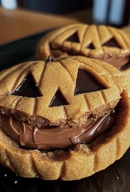 Milk Chocolate Stuffed Jack-O'-Lantern Cookies