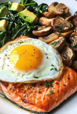 Pan-Seared Salmon with Sunny Egg, Sautéed Spinach, Mushrooms & Avocado