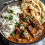Creamy Coconut Curry Beef with Rice and Garlic Naan