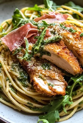 Basil Parmesan Pasta with Crispy Chicken, Prosciutto, and Arugula
